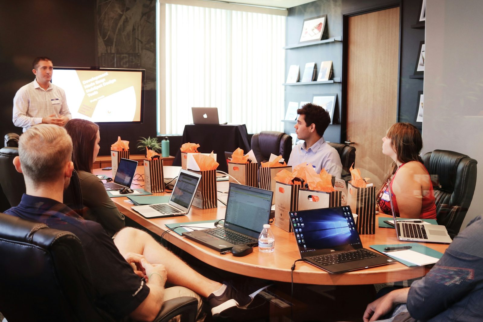 A meeting around a boardroom table