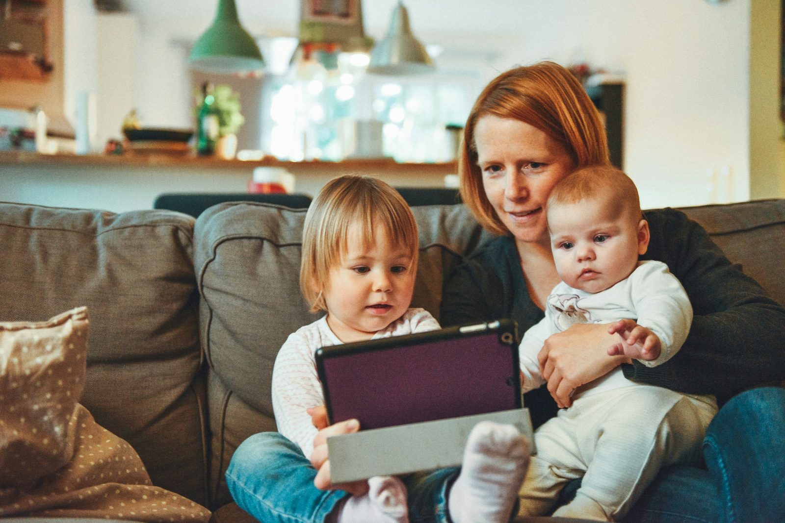 A parent at home with their children